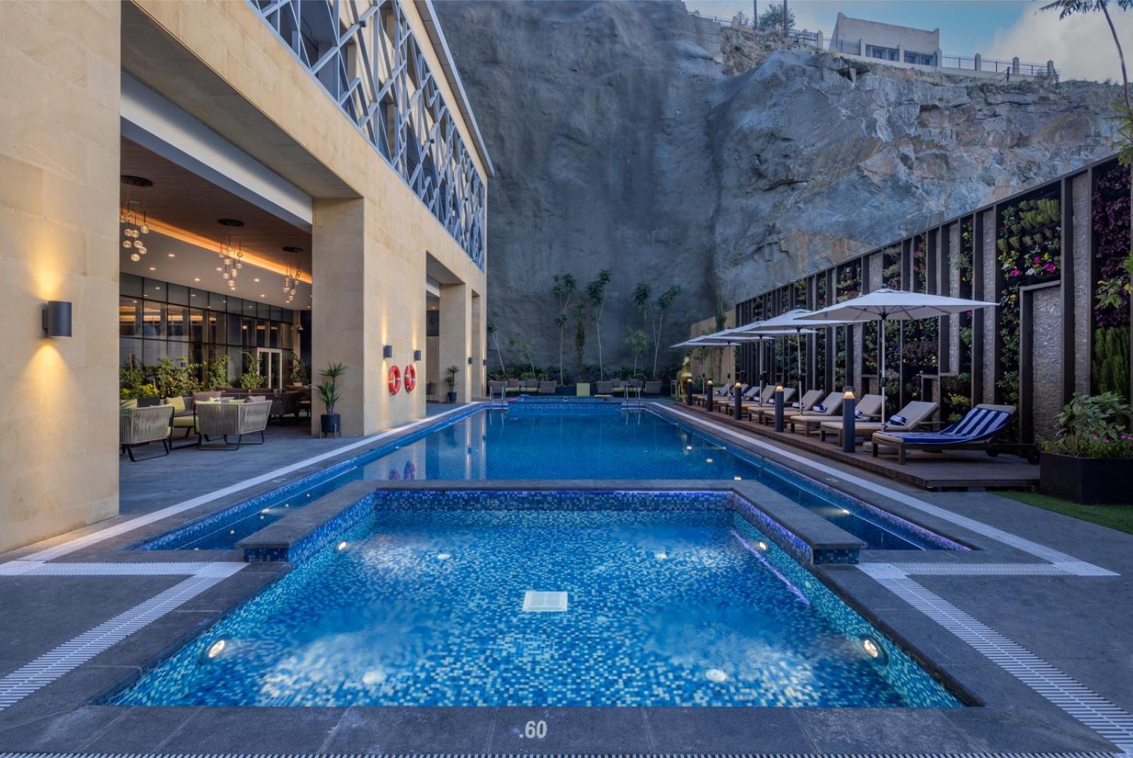 Citadines Abha Aparthotel Екстериор снимка Pool at the hotel