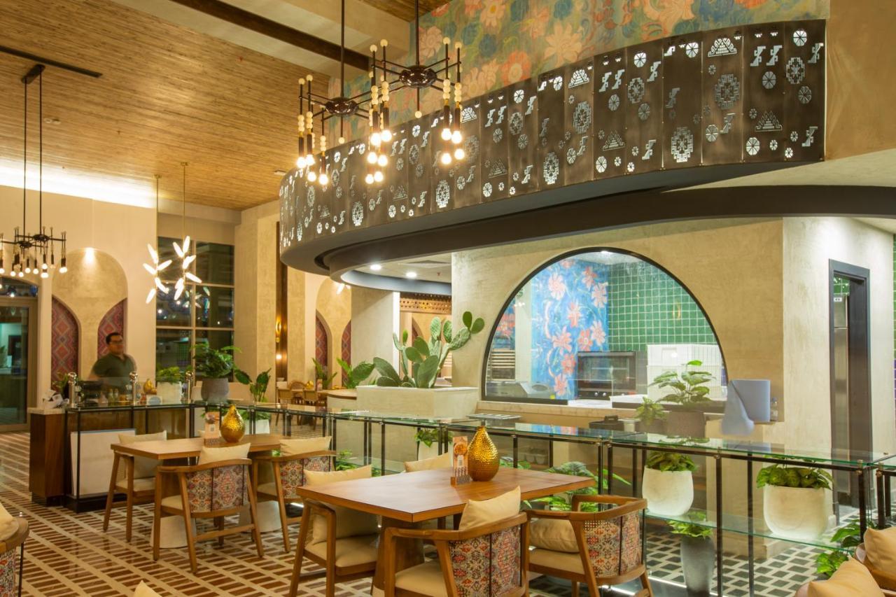 Citadines Abha Aparthotel Екстериор снимка The interior of the restaurant